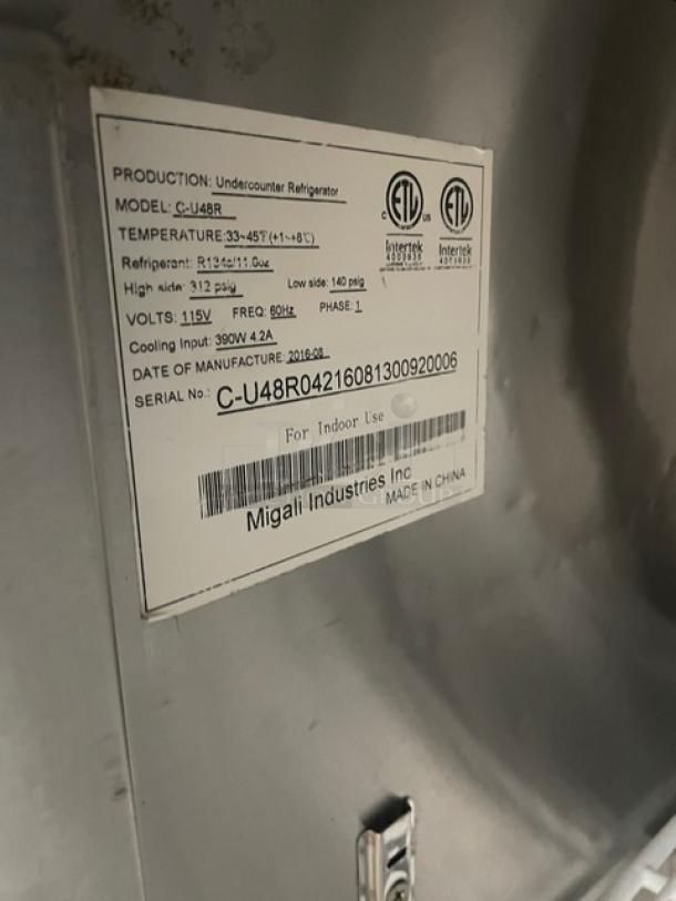 Migali CU48R undercounter refrigerator label showing model, serial number, voltage, and refrigerant details.