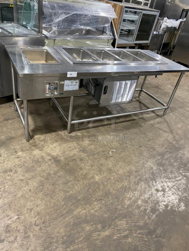 Delfield LiquiTec 4-pan cold food well, stainless steel, electric, model 8159-EFP with Wells hot food well, model MOD100TD.