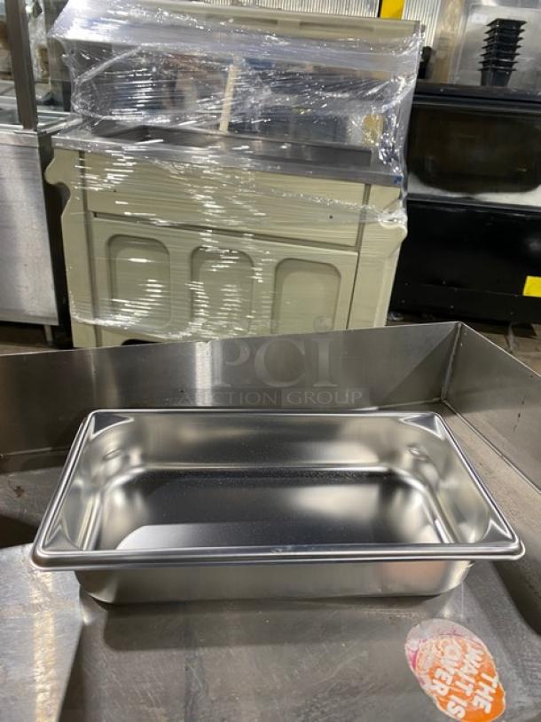 Vollrath SuperPan V Series Stainless Steel 1/3-Size 2.5" deep hotel pan, model 30322, in new condition, on metal counter.