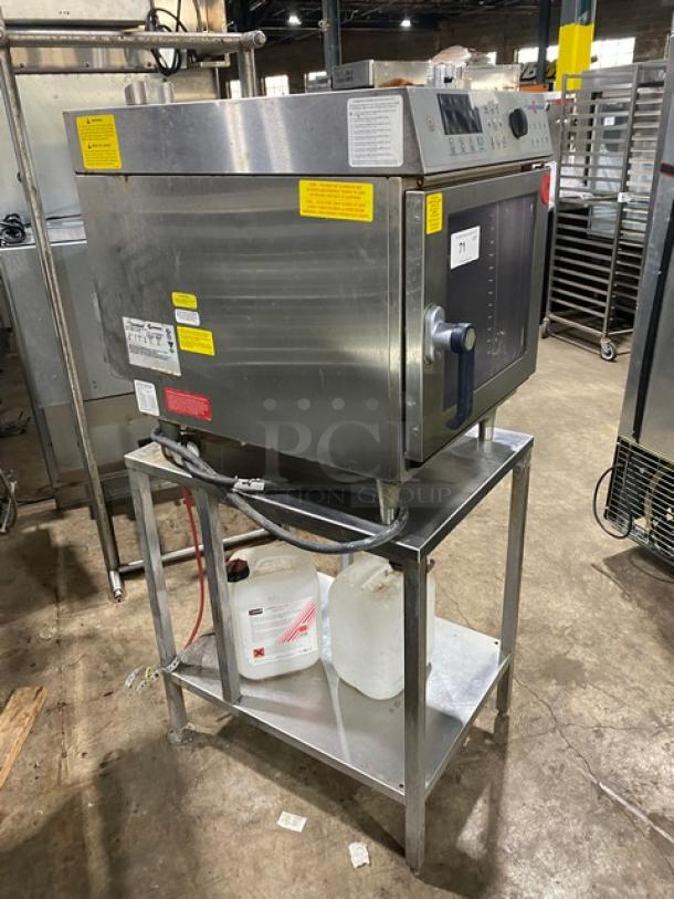 Convotherm OES6.10Mini stainless steel combi oven on single undershelf stand, digital controls, 208/240V 3 phase, used condition.