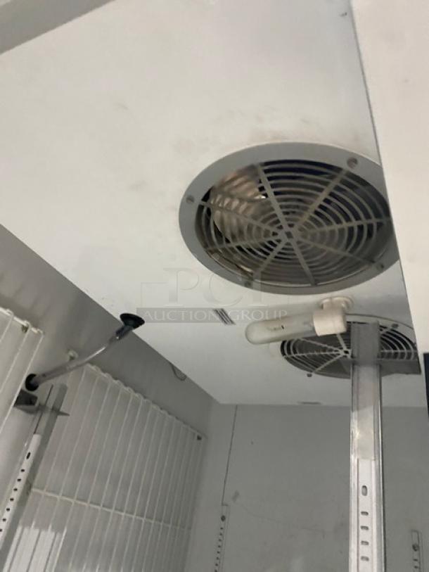 True Commercial Stainless Steel 2 Door Freezer, Model T-49F, with poly-coated wire rack, 115V, good condition.