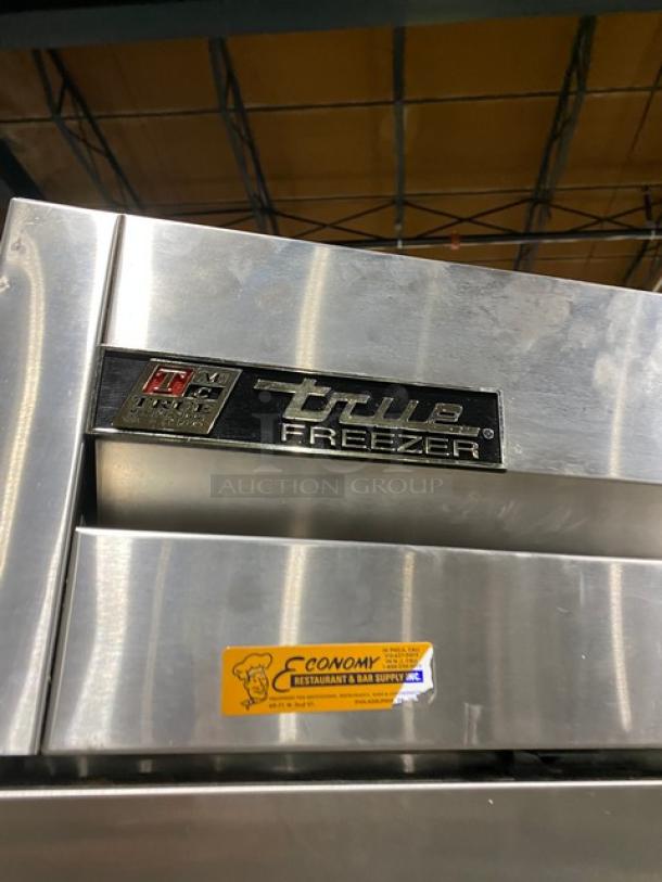 True T49F Stainless Steel 2-Door Freezer, commercial-grade, poly-coated wire rack, excellent condition, 115V 1 Phase.