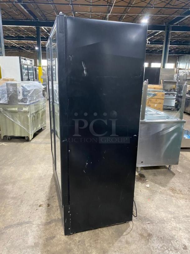 Kool-It Signature Series commercial freezer, model 163LX46FB, black, double glass swing door, with casters and wire racks.