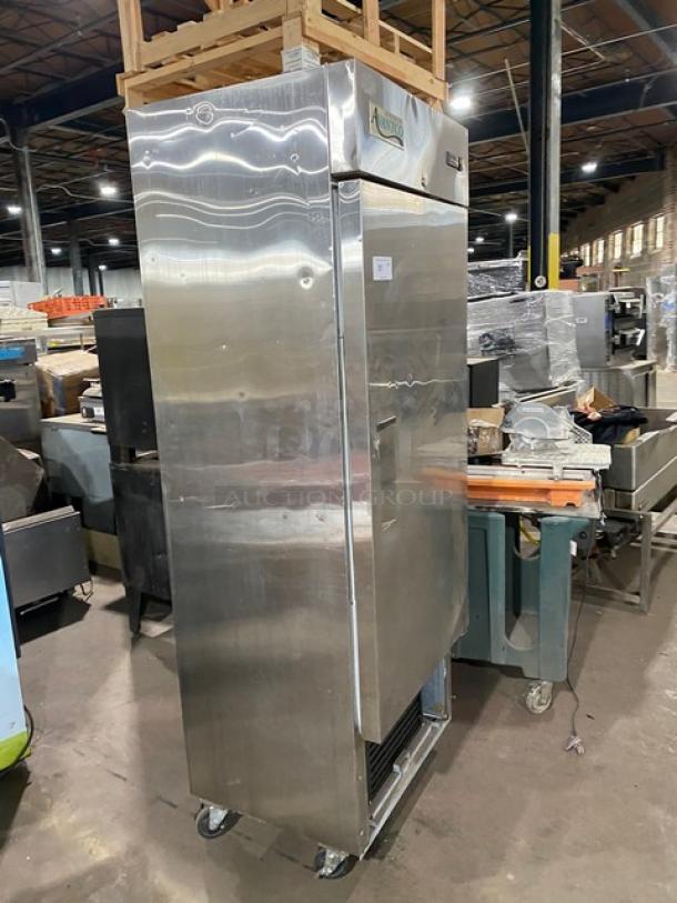 Avantco commercial stainless steel single door reach-in freezer, model 178A19F, on casters, in a warehouse setting.