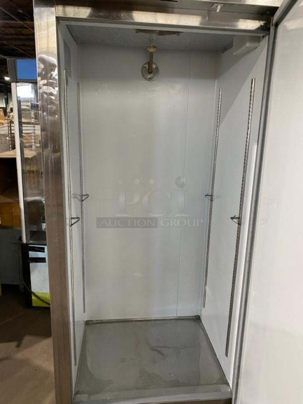 Avantco commercial stainless steel single door reach-in freezer, model 178A19F, on casters. Clean interior, shelving slots visible.