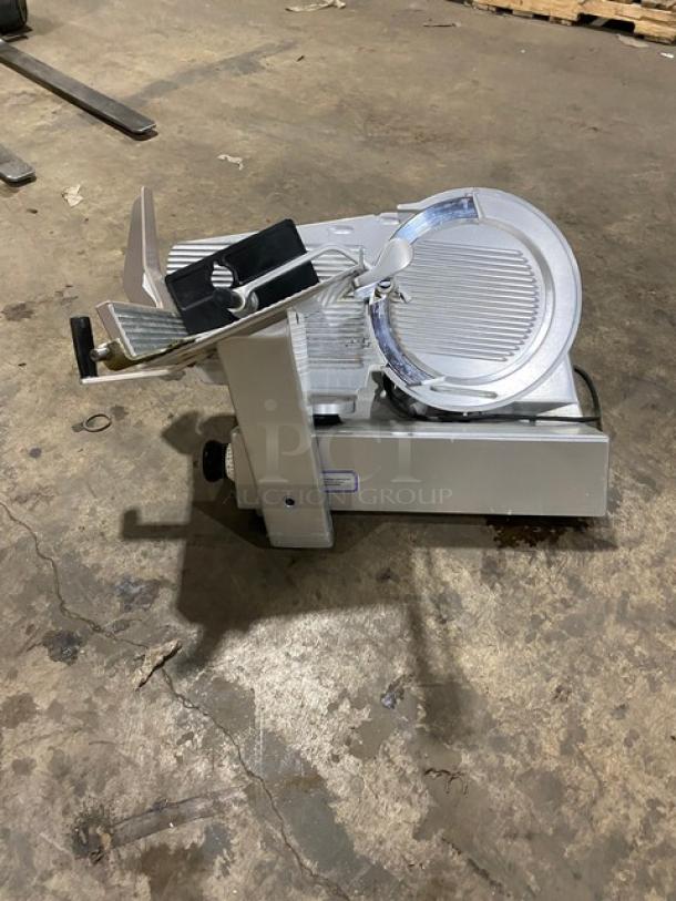 Bizerba commercial electric-powered countertop meat slicer, 120V, on legs. Appears in used condition with visible controls and blade.