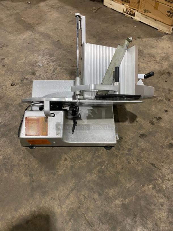 Bizerba commercial electric meat/deli slicer on legs, 120V, in good condition. Countertop model with safety guard.
