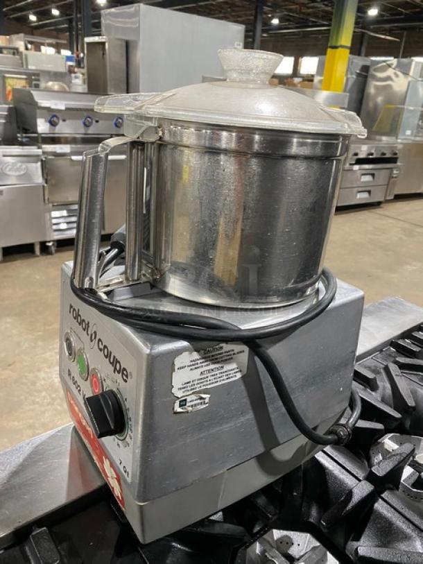 Robot Coupe R602VV commercial food processor with 7 qt. stainless steel bowl, countertop model on legs, clean condition.