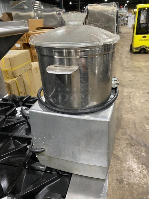 Robot Coupe R602VV commercial food processor with stainless steel 7 qt. mixing bowl. Electric, countertop, on legs.