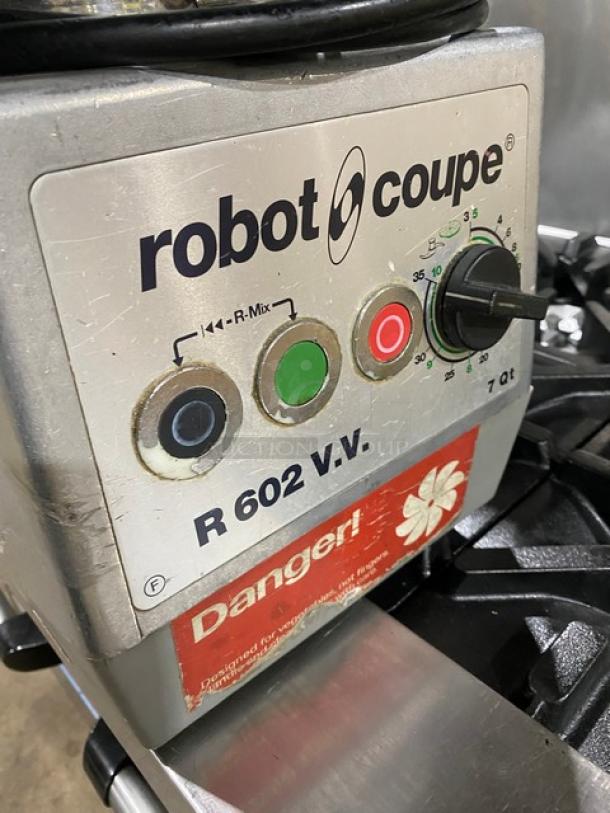 Robot Coupe R602VV food processor, features stainless steel 7 qt. bowl, control panel with buttons, model label visible.