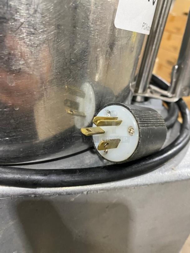 Robot Coupe R602VV commercial food processor with stainless steel 7 Qt. mixing bowl, plug detail, on legs, used condition.