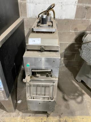 Garland CXBE12 stainless steel electric dual-side clam shell broiler on casters. Used condition, commercial-grade.
