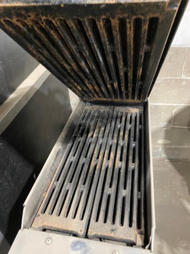 Garland CXBE12 stainless steel electric dual-side clam shell broiler on casters. Visible wear on grill surfaces.