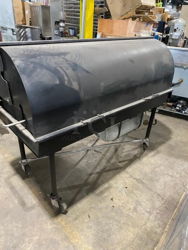 Porta-Grill PG-2460-II black propane BBQ grill on casters, steel body, commercial design, used condition.