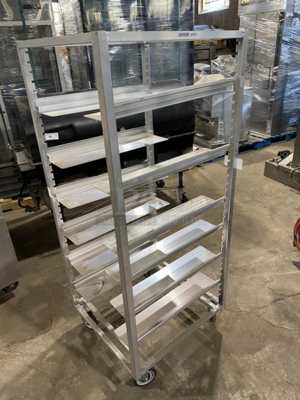 Channel AUR-12 aluminum pan rack with wide slides, on casters, for commercial use, in good condition.