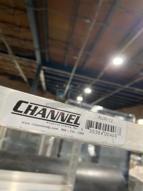 Channel Aluminum Utility Pan Rack, Model AUR-12, wide slides, on casters, commercial use. Channel label visible.