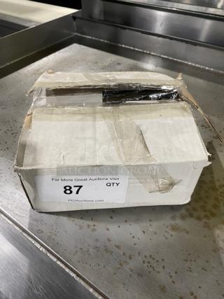 New Amercian MetalCraft Nickel Plated Pan Gripper in box, Model 9525. Box shows wear. Auction label: "87 QTY PCIAuctions.com".