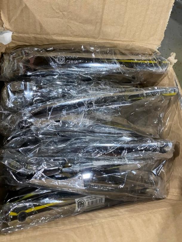 New Amercian MetalCraft pan grippers, model 9525, nickel-plated, in original packaging, shown in an open box.