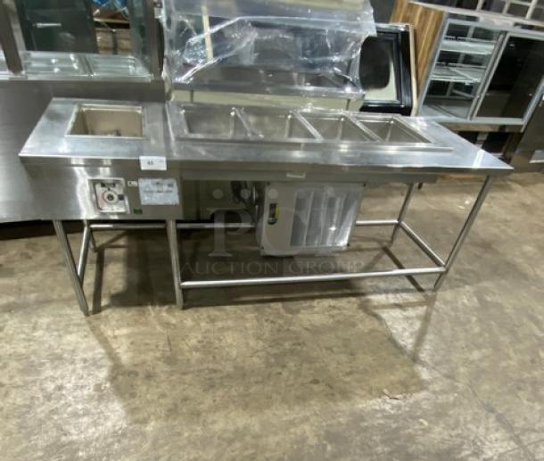 Delfield LiquiTec 4-pan cold food well, stainless steel, Model 8159EFP, with Wells single-pan hot food well, Model MOD100TD, on legs.