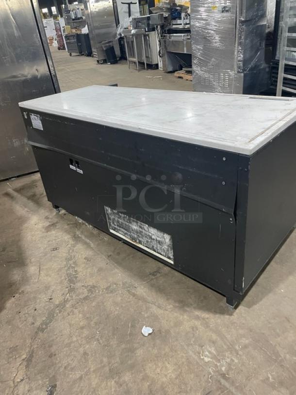 Structural Concepts SBZ6652DR black refrigerated display case on legs. Commercial-grade for grab-n-go, 220V, used condition.