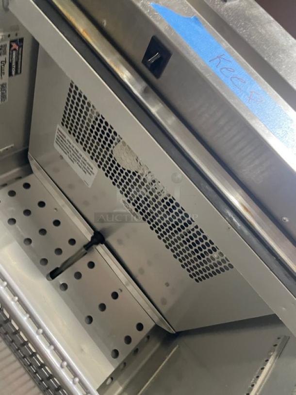 True Commercial Stainless Steel Single Door Freezer, Model T-19F-HC, Energy Star Certified, poly-coated wire rack, on casters.