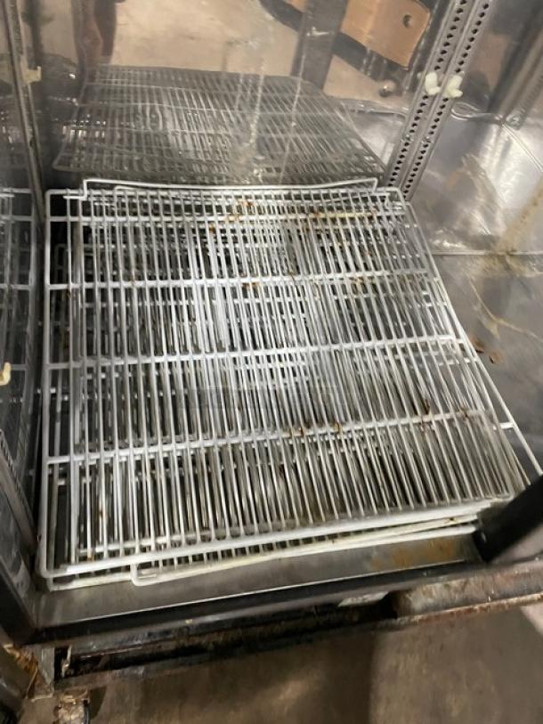 Turbo Air MSF49NM Commercial Freezer interior, poly-coated wire racks. Shows light wear. Model: MSF-49NM, SN: NF49502051.