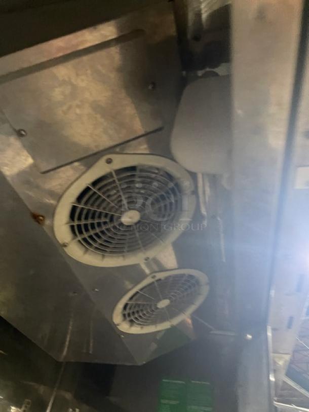 Turbo Air MSF-49NM Freezer, stainless steel, dual fans, poly coated wire racks, on casters, Model SN: NF49502051, 110-120V.