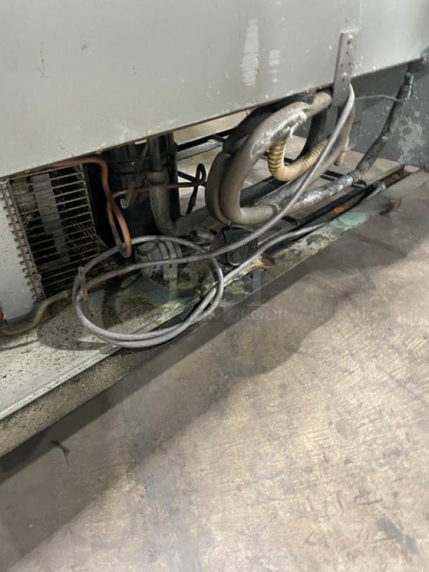 Turbo Air Maximum Series 2 Door Reach-In Freezer, Model MSF-49NM. Visible wiring and components, on casters, wear evident.