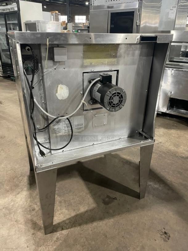 SunFire SCOGS10S commercial stainless steel convection oven, natural gas, thermostatic controls, wired racks, on legs.