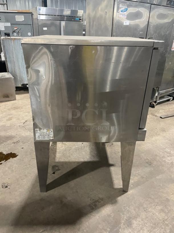 SunFire SCOGS10S stainless steel convection oven. Natural gas, thermostatic controls, wired racks, on legs, Model SCO-GS-10S.