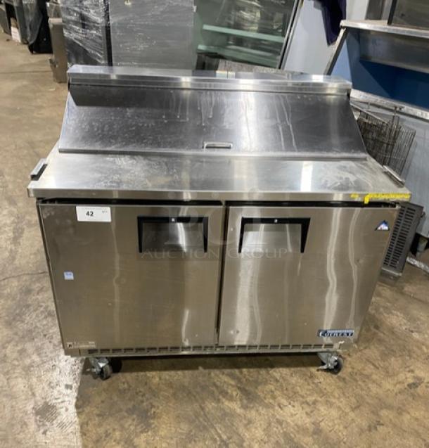 Everest EPBNR2 stainless steel 2-door refrigerated bain marie prep table. Features casters, SN: BPBNR215010025, 115V, 1-phase.