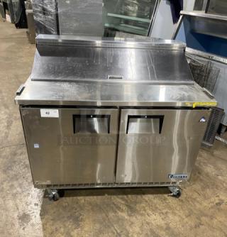Everest EPBNR2 stainless steel 2-door refrigerated bain marie prep table. Features casters, SN: BPBNR215010025, 115V, 1-phase.