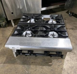 American Range commercial stainless steel countertop 4 burner range, natural gas powered, excellent condition.