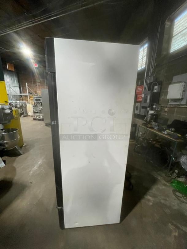 True Commercial Black Triple Glass Door Merchandiser Freezer, Model GDM72FLD. Energy Star. Poly Coated Wire Racks.