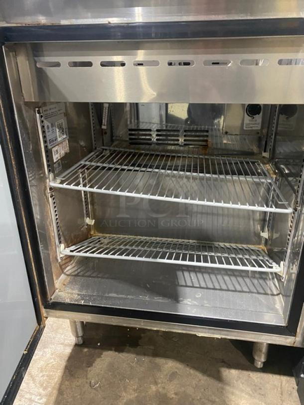 Turbo Air MST-28-711S stainless steel refrigerated prep table with poly-coated wire rack. Model label visible.