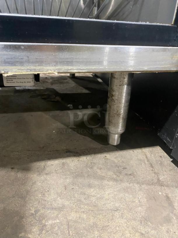 Turbo Air Single Door Refrigerated Prep Table, Model MST-28-711S, with sneeze guard, poly-coated wire rack.