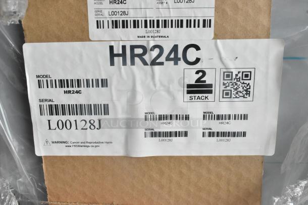 Alt text: Hoshizaki HR24C stainless steel cooler packaging, showing model and serial numbers L00128J, new condition label visible.