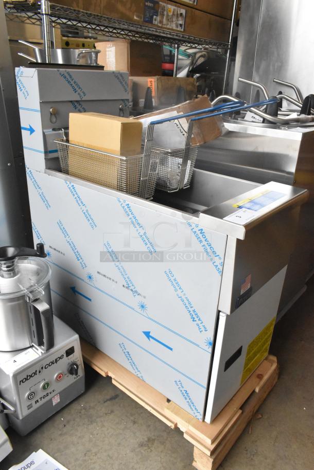 Brand new 2022 Pitco Frialator SG14 stainless steel commercial deep fryer, natural gas, 110,000 BTU, with 2 baskets.