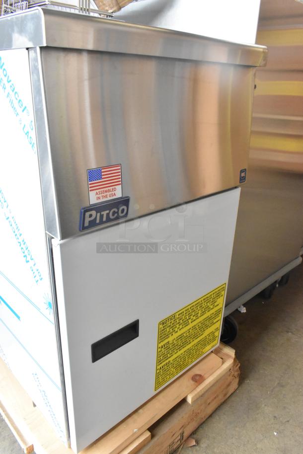 Brand new Pitco Frialator SG14 stainless steel commercial gas fryer with 2 metal baskets. 110,000 BTU. Tags indicate U.S. assembly.