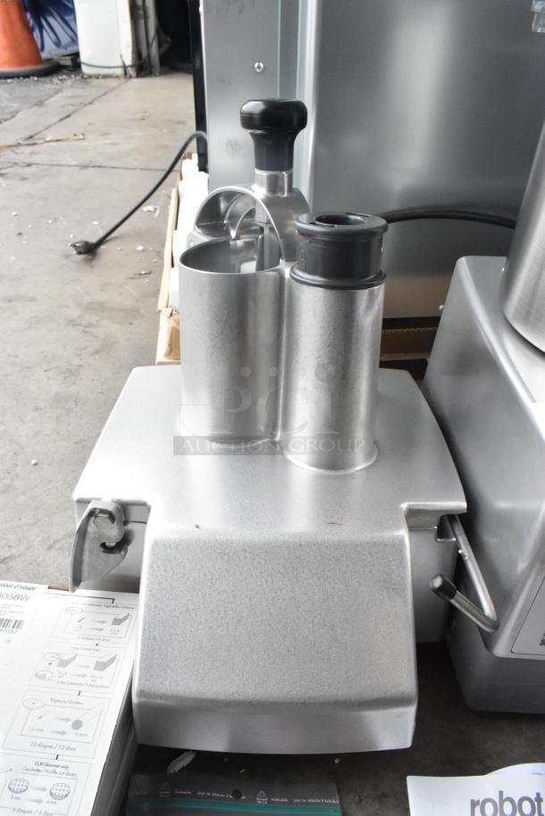 Brand new Robot Coupe R702V.V metal commercial food processor with bowl, continuous feed head, grater, slicer. 120V, 1 phase.