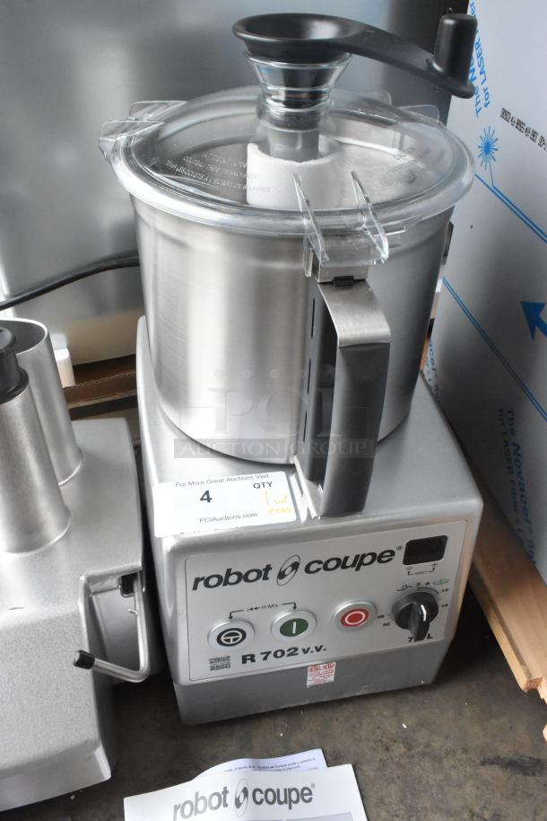 Brand new Robot Coupe R702V.V metal commercial food processor with bowl, grater, slicer, continuous feed head. 120V, 1 Phase.