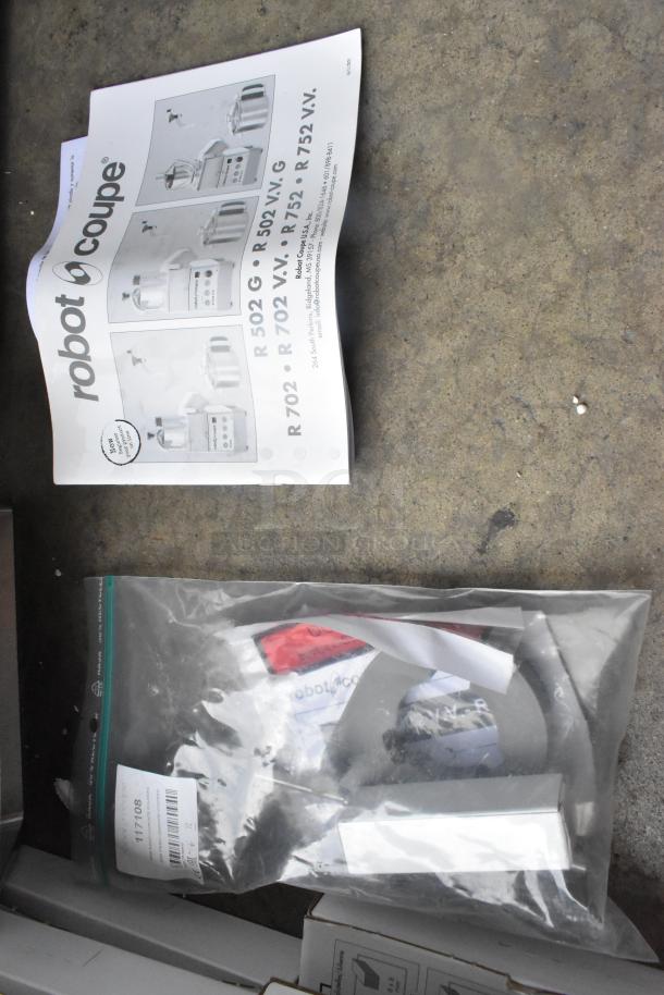 Brand new Robot Coupe R702V.V food processor, includes bowl, continuous feed head, 28058W grater, 28064W slicer, 29246 kit.