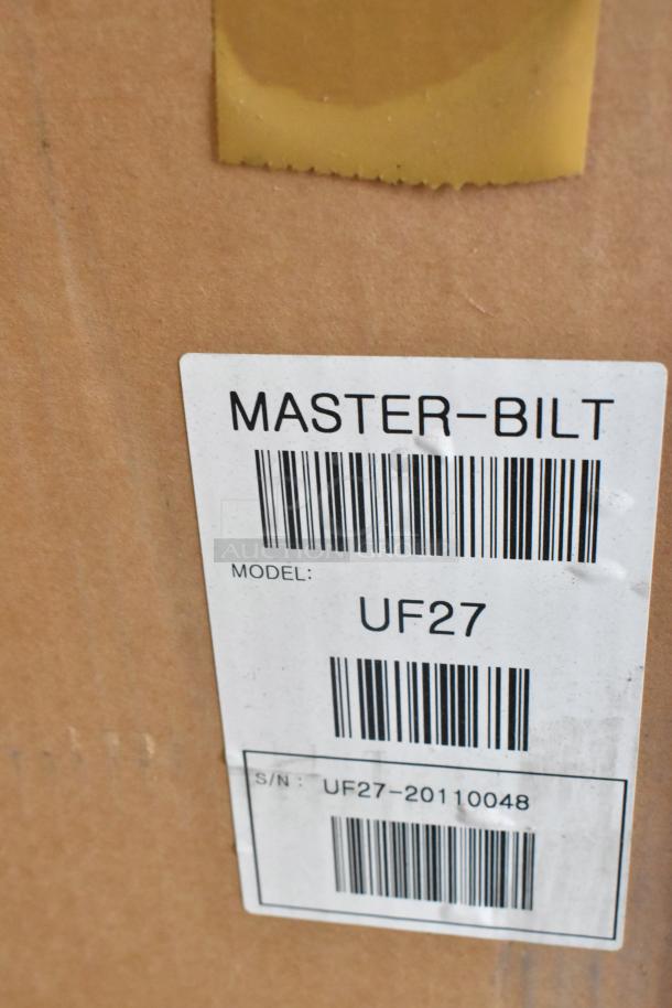 Label on a Master-Bilt UF27 commercial freezer box. Model UF27, serial UF27-20110048. New, 115V, 1 Phase.