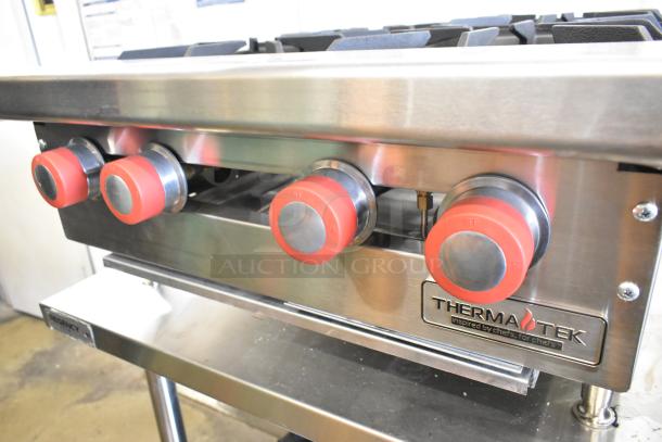 BRAND NEW Therma-Tek TCHP24-4L stainless steel 4 burner range, propane gas-powered, 30,000 BTU, visible branding.