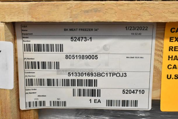 Brand new 2022 BKI 52473-1 stainless steel commercial freezer, 115 volts, 1 phase, on casters. Label shows model and serial number.
