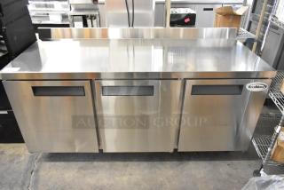 Stainless steel KoolMore RWT-3D-16C commercial 3-door cooler; missing one caster, new condition, 115V, 1 phase.