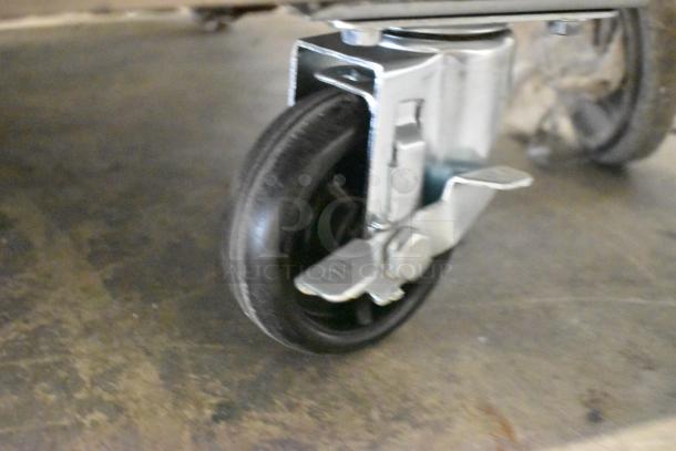 Brand new KoolMore RWT-3D-16C commercial cooler caster. Stainless steel. Missing one caster.