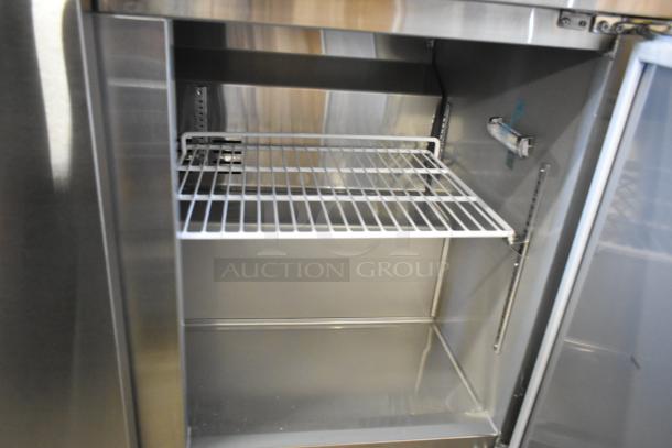 Brand new 2023 KoolMore RWT-3D-16C stainless steel 3-door work top cooler. Missing one caster. 115 volts, 1 phase.