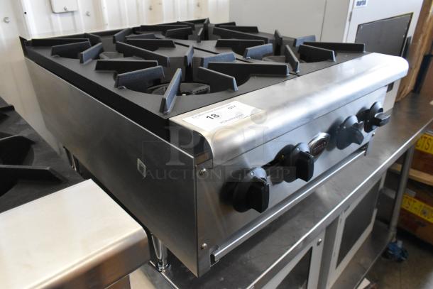 BRAND NEW 2020 Wells HDHP-2430G stainless steel 4 burner gas range. Commercial countertop model in pristine condition.