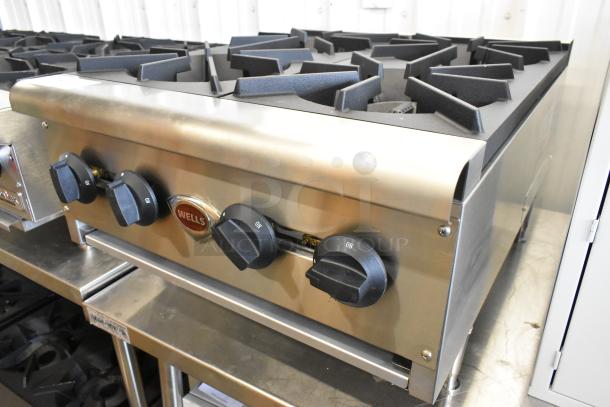 Brand new Wells HDHP-2430G stainless steel 4-burner commercial range. Countertop, natural gas, 2020 model.